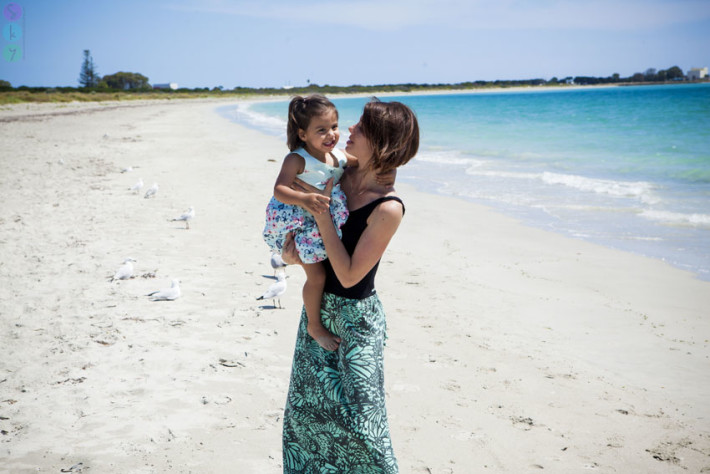 Mother daughter family photos beach fun