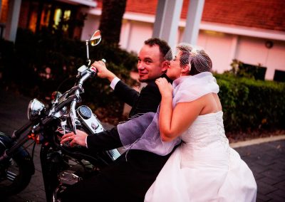 Atlanta Wedding Photographers Photo of Bride and Groom on Bike